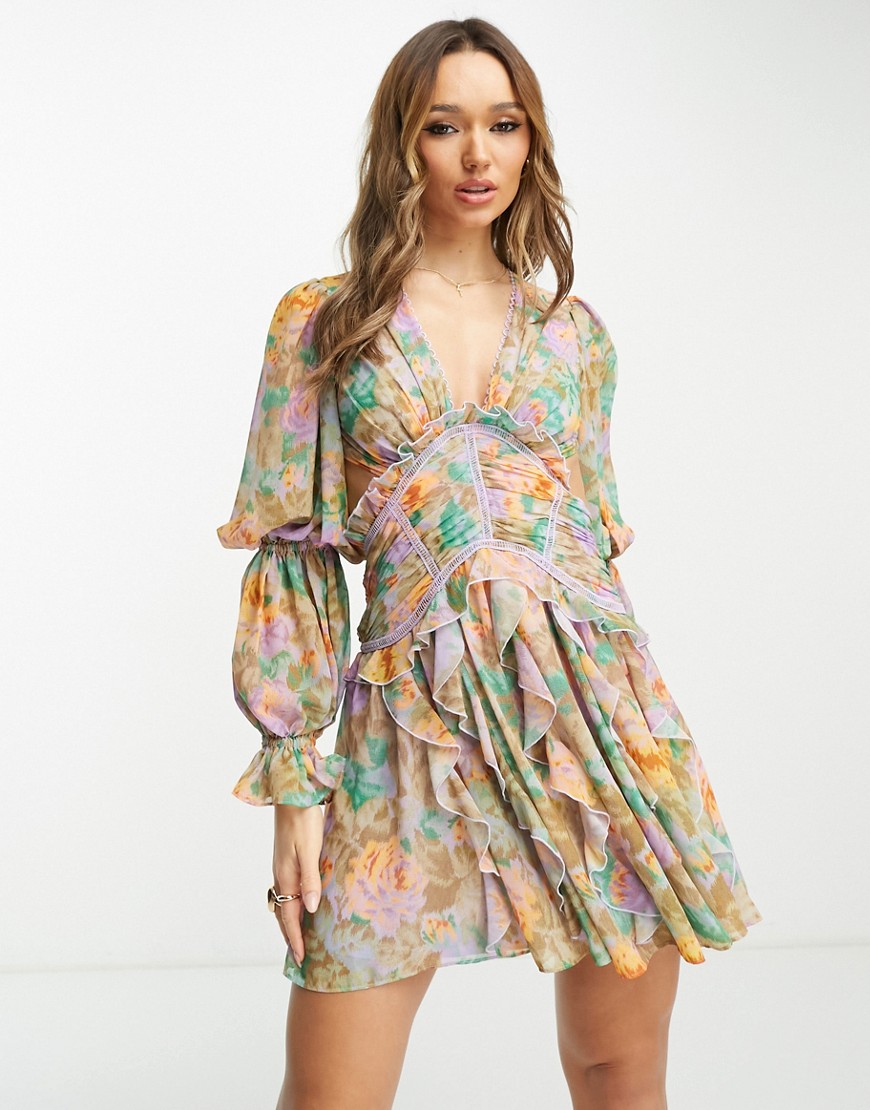 ASOS DESIGN ruched waist plunge mini dress with ruffle skirt and open back detail in blurred floral 