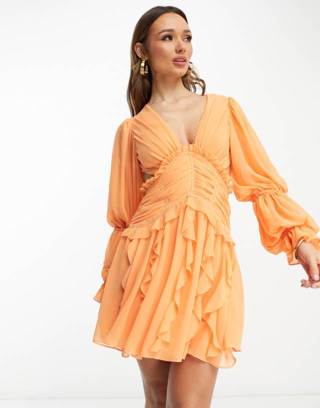 ASOS DESIGN Ruched waist plunge mini dress with ruffle skirt and open back detail in orange