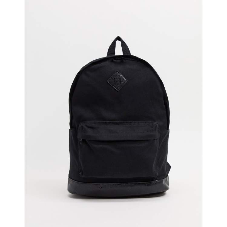 ASOS DESIGN Rucksack aus Canvas in Schwarz mit Kunstlederboden