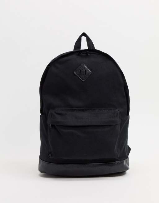 ASOS DESIGN Rucksack aus Canvas in Schwarz mit Kunstlederboden