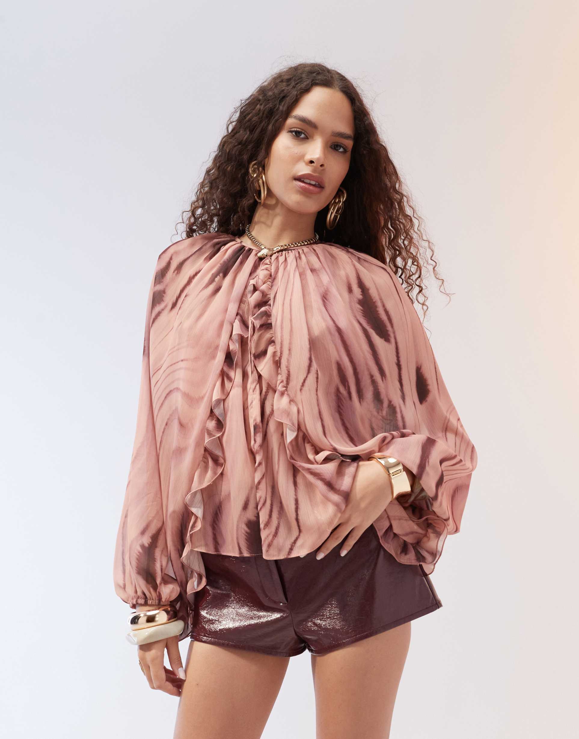 asos design ruffle detail cape sleeve chiffon top in woodland print