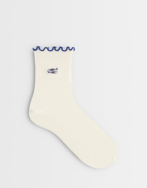 ASOS DESIGN ruffle edge ankle socks with sardine embroidery in white - view 1