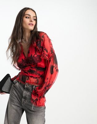 ASOS DESIGN ruffle frill blouse with lace trim & pleat waist in red floral