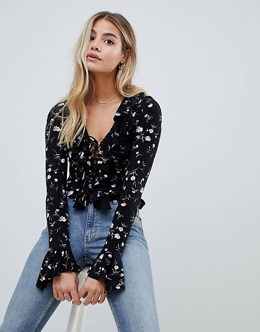 ASOS DESIGN ruffle front lace up top in ditsy floral print
