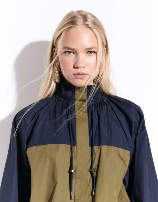 ASOS DESIGN ruffle neck track mini dress in navy and olive colour block, 2 of 8
