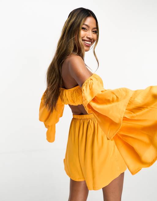 Orange ruffle sleeve top online