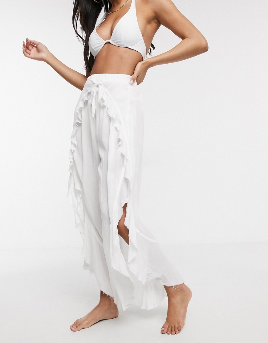 ASOS DESIGN ruffle split front beach trousers with tie waist in white
