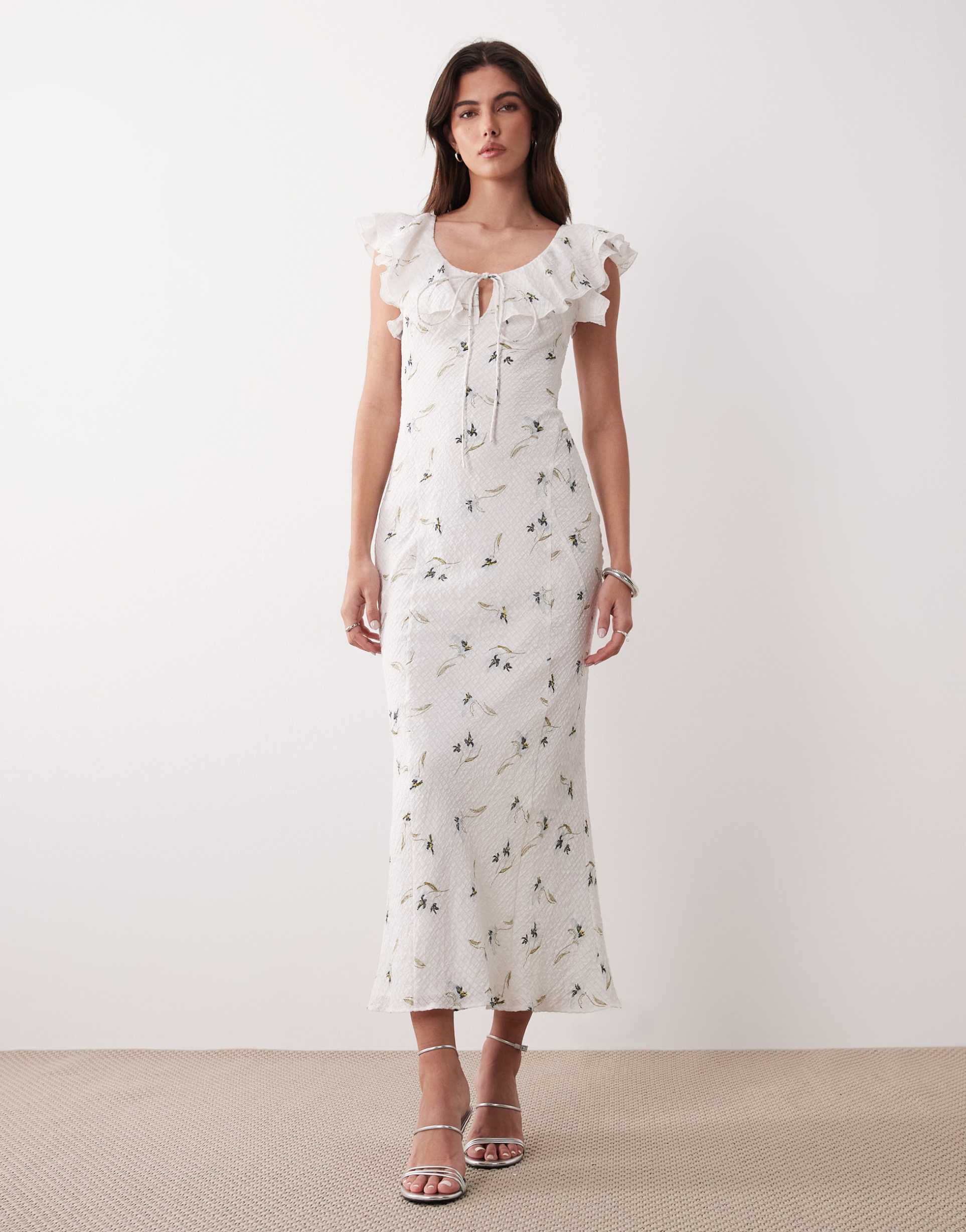 asos design ruffle sweetheart neckline textured maxi dress in cream with blue floral print