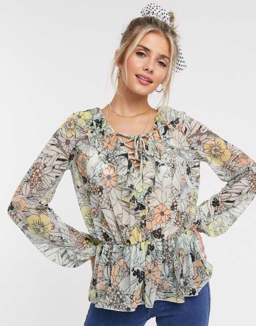ASOS DESIGN ruffle top with peplum hem in floral
