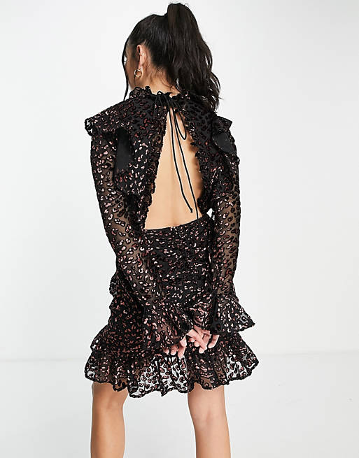 Dresses ruffle wrap mini dress in leopard devore fabric 