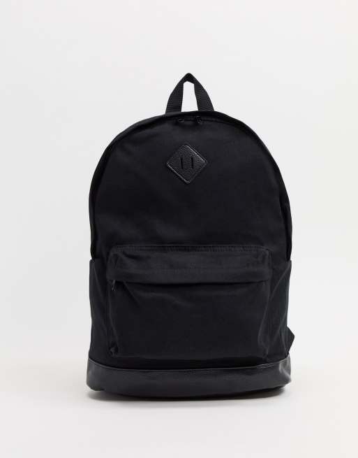 ASOS DESIGN - Rugzak van canvas met onderkant van imitatieleer in zwart