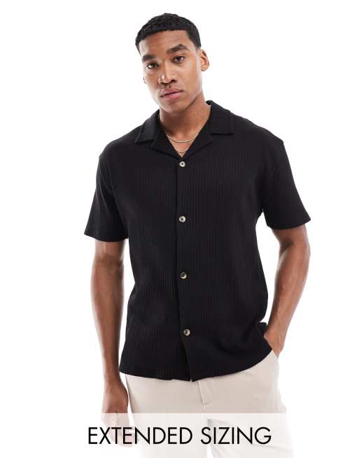 ASOS DESIGN - Ruimvallend geribbeld poloshirt in zwart