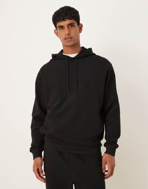 ASOS DESIGN - Ruimvallend hoodie van co-ord set met geribbelde textuur in zwart - view 1