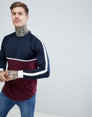 ASOS DESIGN - Ruimvallend lang T-shirt met lange mouwen, contrasterende schouderpas en ronde zoom van geweven stof in marineblauw