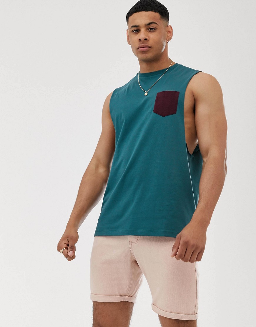 ASOS DESIGN - Ruimvallend mouwloos T-shirt met verlaagde armsgaten en contrasterende zak in groen