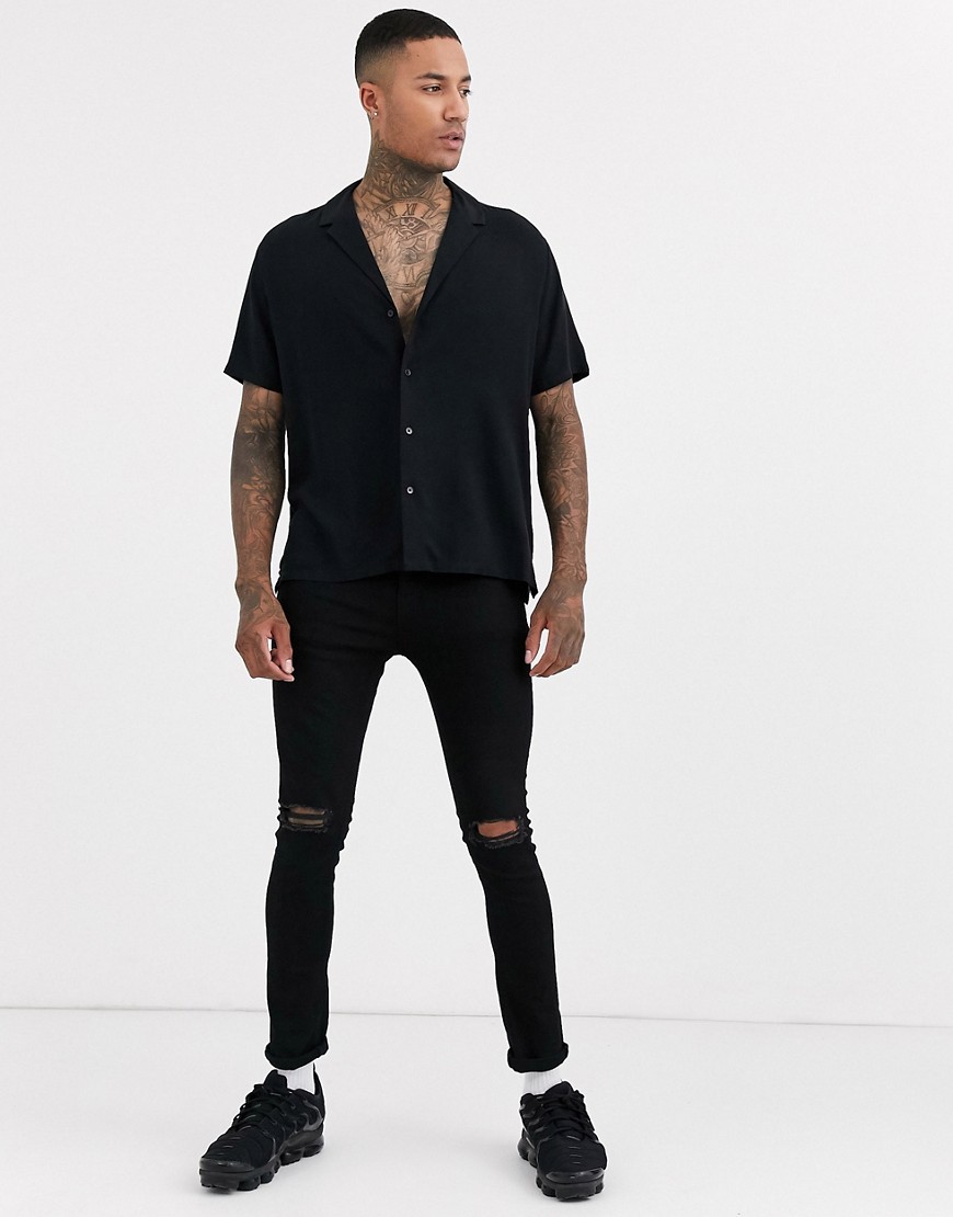 ASOS DESIGN - Ruimvallend overhemd met lage reverskraag van viscose in zwart