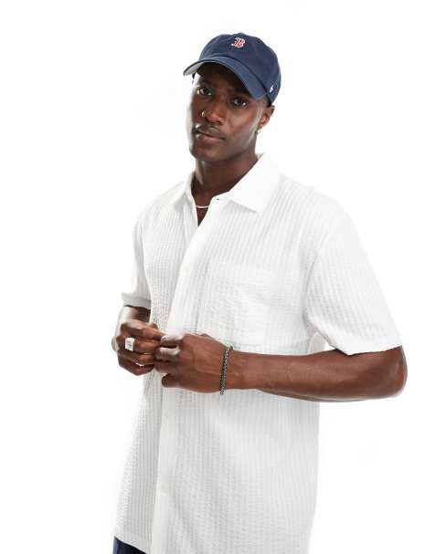 ASOS DESIGN - Ruimvallend poloshirt met zak aan de voorkant in wit - view 1