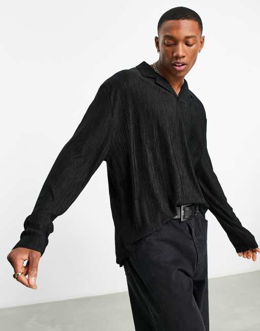 ASOS DESIGN - Ruimvallend poloshirt van plissé stof met lange mouwen met reverskraag in zwart
