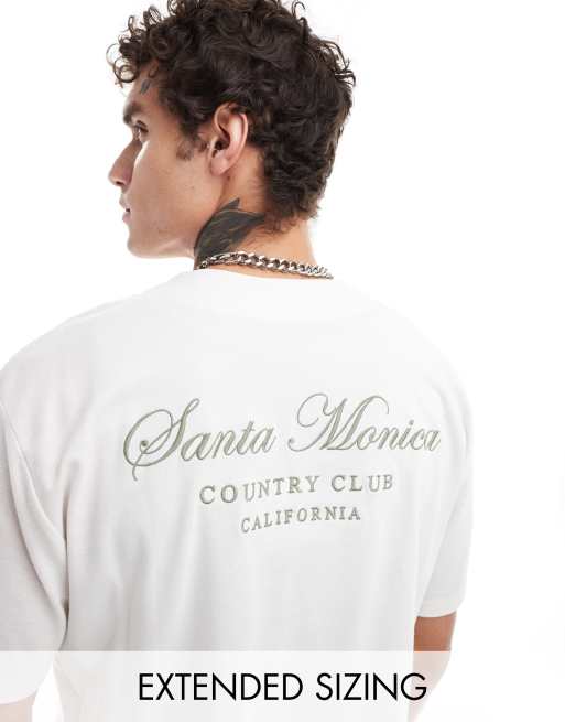 ASOS DESIGN - Ruimvallend recht T-shirt met stadsprint op de achterkant in gebroken wit