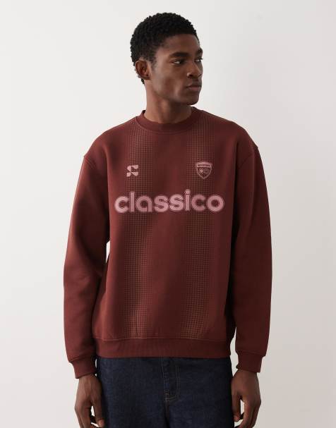 ASOS DESIGN - Ruimvallend sweatshirt met ronde hals en voetbalprint in bruin - view 1