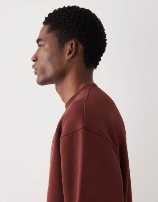 ASOS DESIGN - Ruimvallend sweatshirt met ronde hals en voetbalprint in bruin, 4 van 5