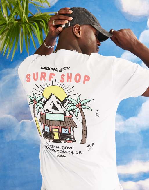ASOS DESIGN - Ruimvallend T-shirt in blauw met striptekening- en 'Surf'-print op de voor- en achterkant