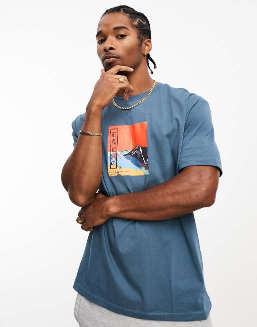 ASOS DESIGN - Ruimvallend T-shirt in koel blauw met bergprint op de borst