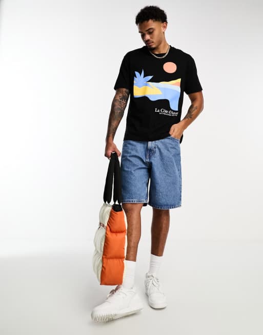 ASOS DESIGN - Ruimvallend T-shirt in zwart met abstracte zonsondergang-print op de achterkant
