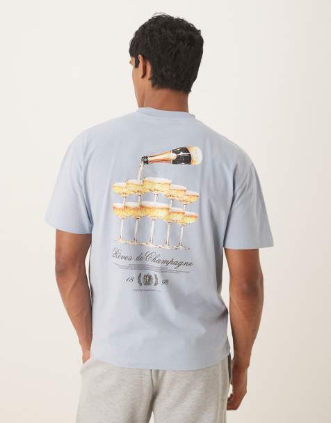 ASOS DESIGN - Ruimvallend T-shirt met drankjesprint in lichtblauw - view 1
