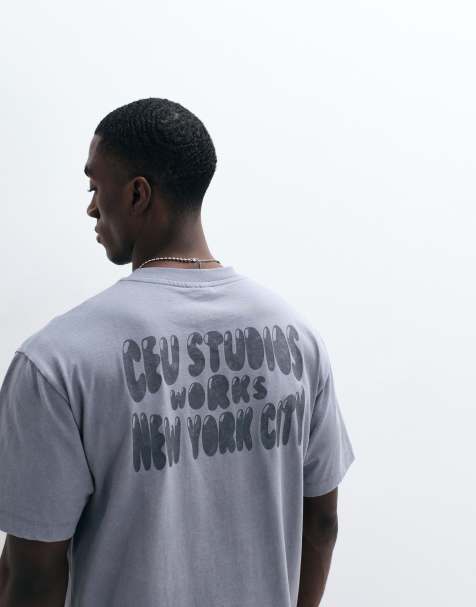 ASOS DESIGN - Ruimvallend T-shirt met grafische tekstprint in grijs met wassing - view 1