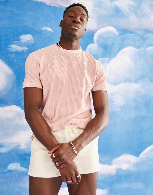 ASOS DESIGN - Ruimvallend T-shirt van geribbeld velours in roze