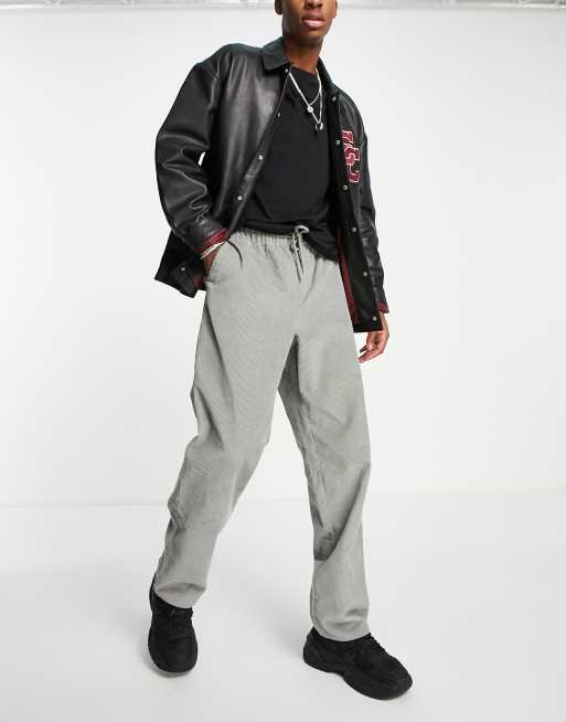 ASOS DESIGN - Ruimvallende corduroy broek in groen