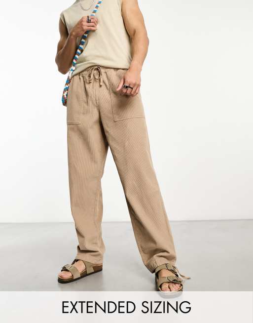 ASOS DESIGN - Ruimvallende corduroy broek in lichtbruin