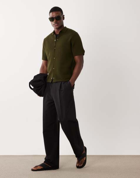 ASOS DESIGN - Ruimvallende gebreid poloshirt met wafelstructuur en knoopsluiting in kaki - view 1