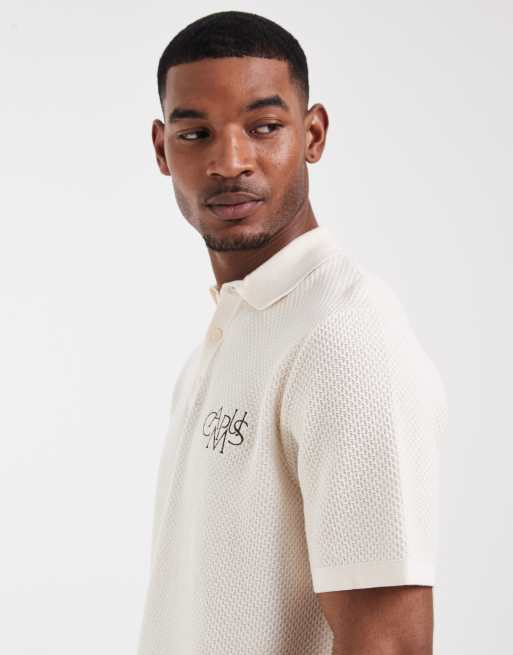 ASOS DESIGN - Ruimvallende gebreide polo met borduursel op de borst in ecru, 4 van 5