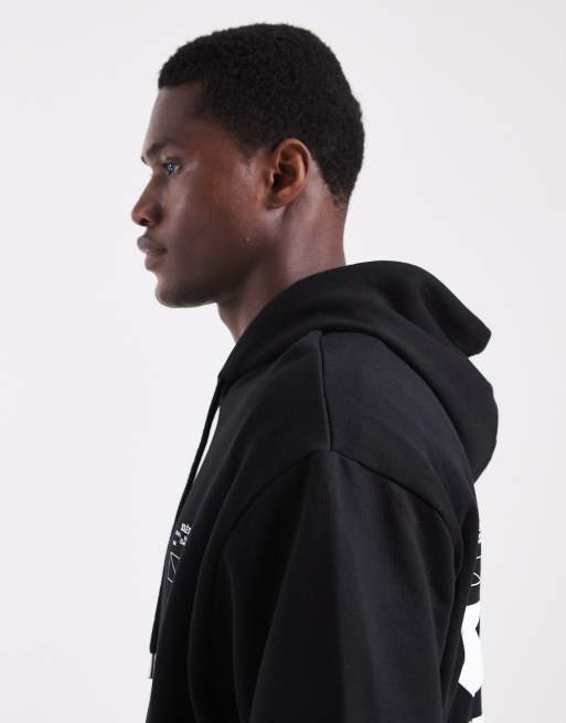 ASOS DESIGN - Ruimvallende hoodie met logoprint in zwart, 4 van 5