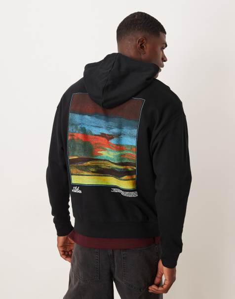 ASOS DESIGN - Ruimvallende hoodie met souvenir-print op de achterkant in zwart - view 1
