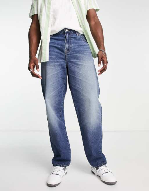 ASOS DESIGN - Ruimvallende jeans in donkere wassing