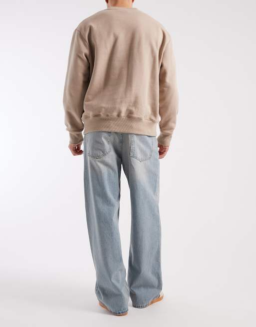ASOS DESIGN - Ruimvallende jeans in lichtblauwe wassing met tint, 2 van 5