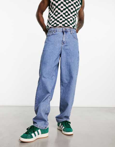 ASOS DESIGN - Ruimvallende jeans met middenblauwe wasing - view 1