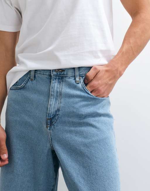 ASOS DESIGN - Ruimvallende jeans met middenblauwe wasing , 4 van 5