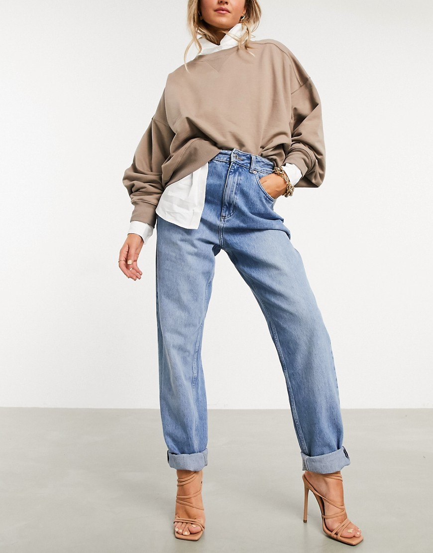 ASOS DESIGN - Ruimvallende mom jeans met hoge taille en medium wassing-Blauw