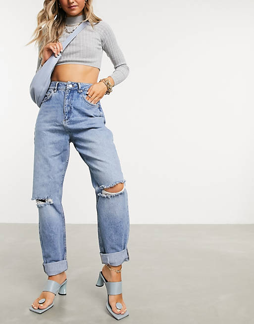 ASOS DESIGN - Ruimvallende mom jeans met hoge taille in midwash met scheuren
