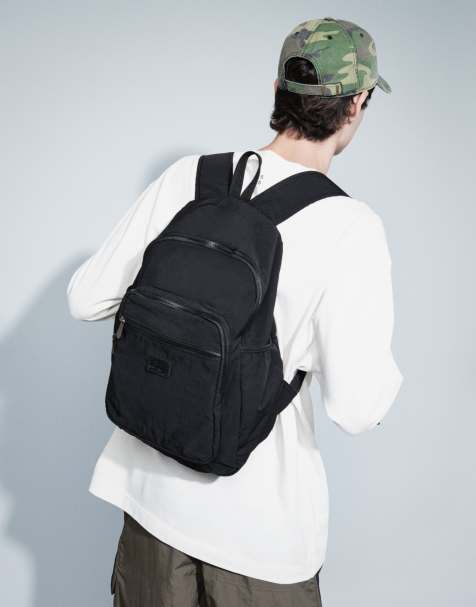 ASOS DESIGN - Ruimvallende nylon rugzak in zwart - view 1