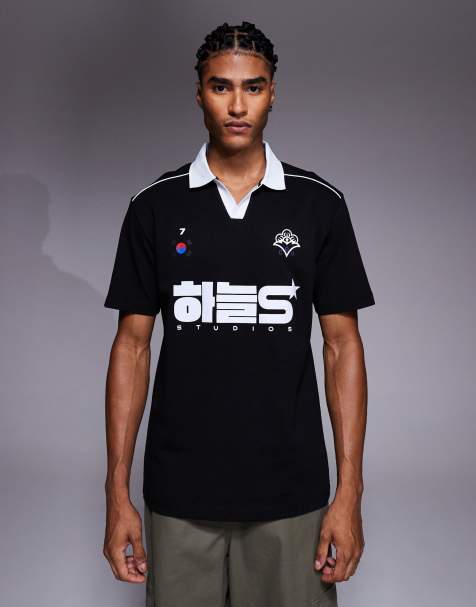 ASOS DESIGN - Ruimvallende polo met biezen en grafische sportprint in zwart - view 1