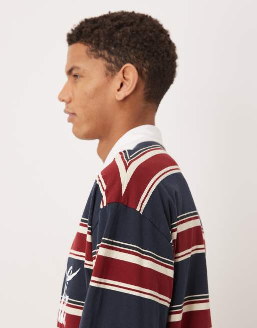 ASOS DESIGN - Ruimvallende polo met Coca Cola-print in marineblauw, 4 van 5