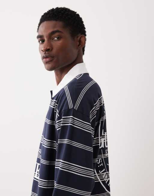 ASOS DESIGN - Ruimvallende polo met Guinness-print in marineblauw, 4 van 5