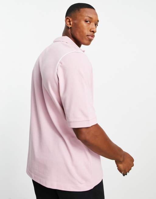 ASOS DESIGN - Ruimvallende polo van piqué in roze met witte biezen, 2 van 4
