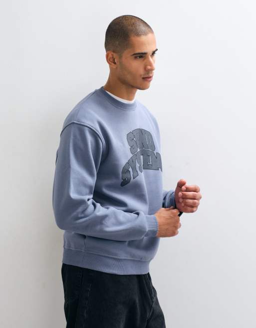 ASOS DESIGN ruimvallende sweatshirt met collegiate print op de voorkant in blauw, 3 van 5