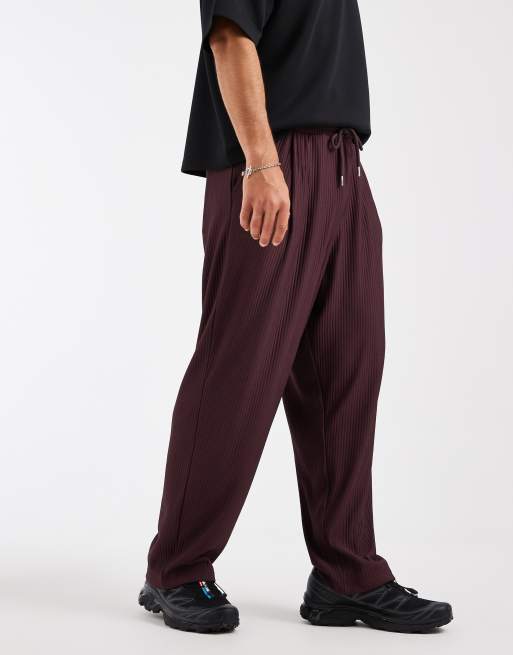 ASOS DESIGN - Ruimvallende toelopende geplooide joggingbroek in bruin, 2 van 5